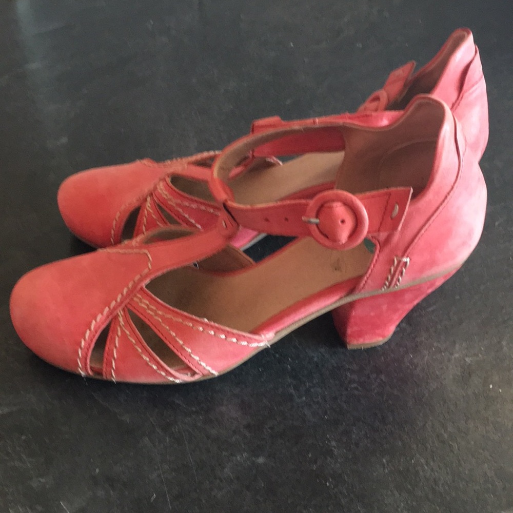 Red leather heeled shoes. Very comfortable!